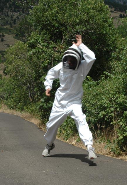 Beekeeping_Protective_Gear_waving_arms